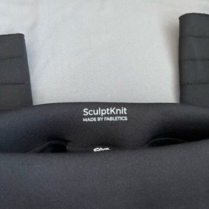 Black SculptKnit leggings by Fabletics. Size M.